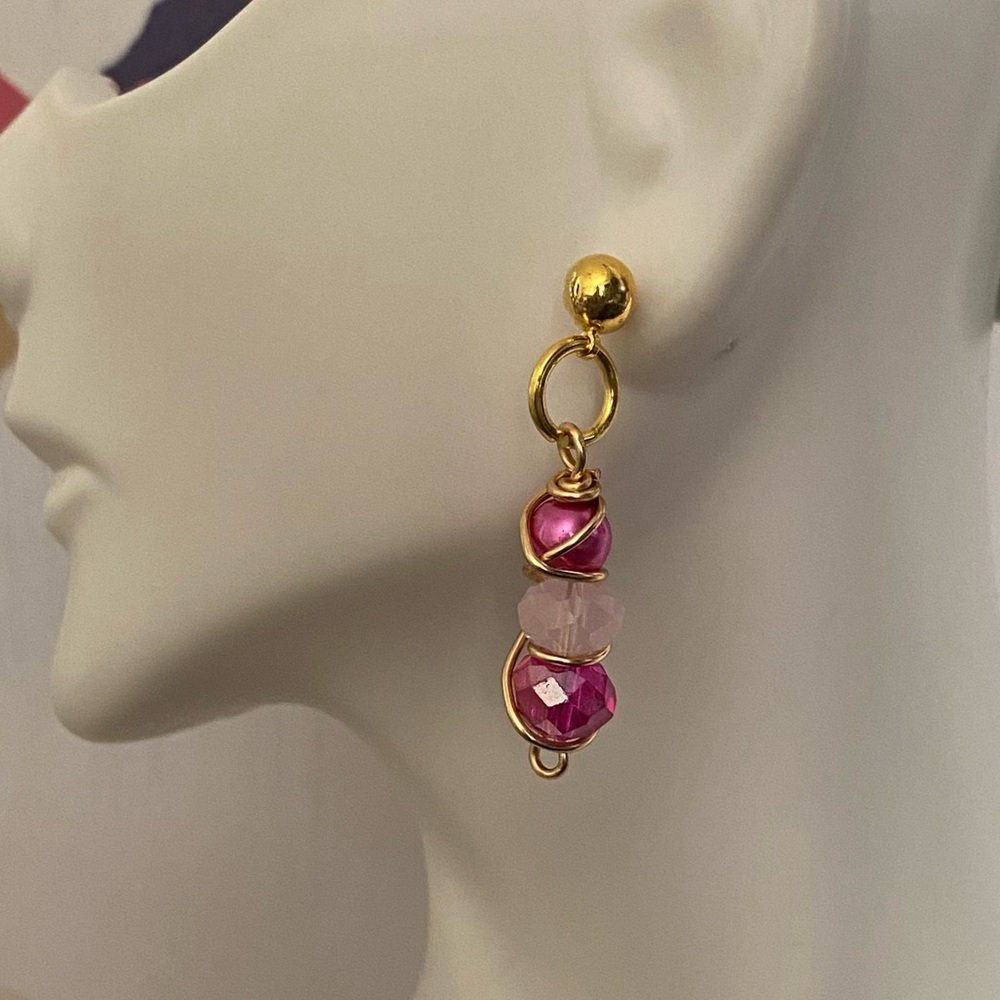 Wire wrapped earrings in a bottle